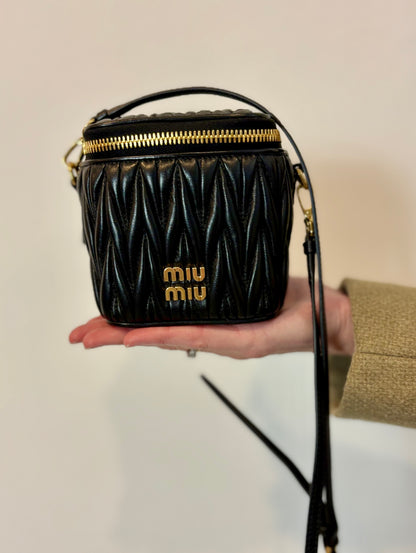 MIU MIU. Matelassé nappa leather micro bag