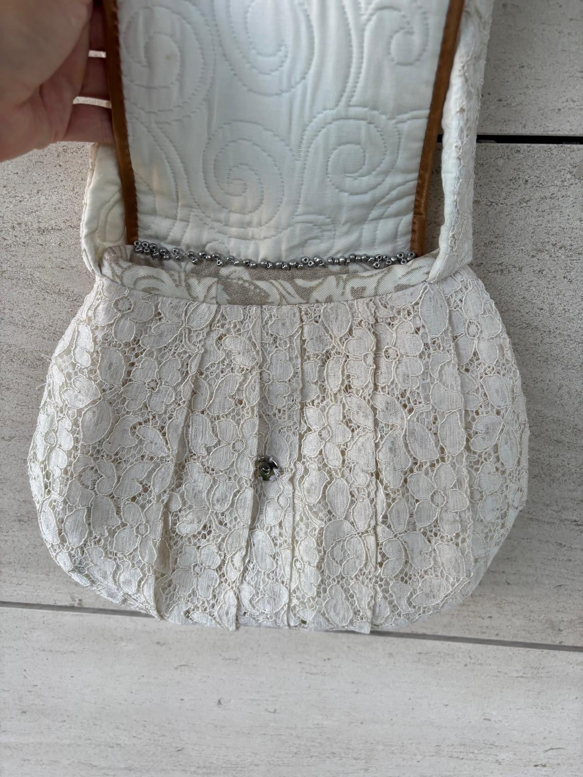 OTRAS. Bolso de hombro texturas
