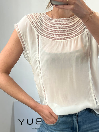 CLAUDIE PIERLOT. White lace blouse. T.S.