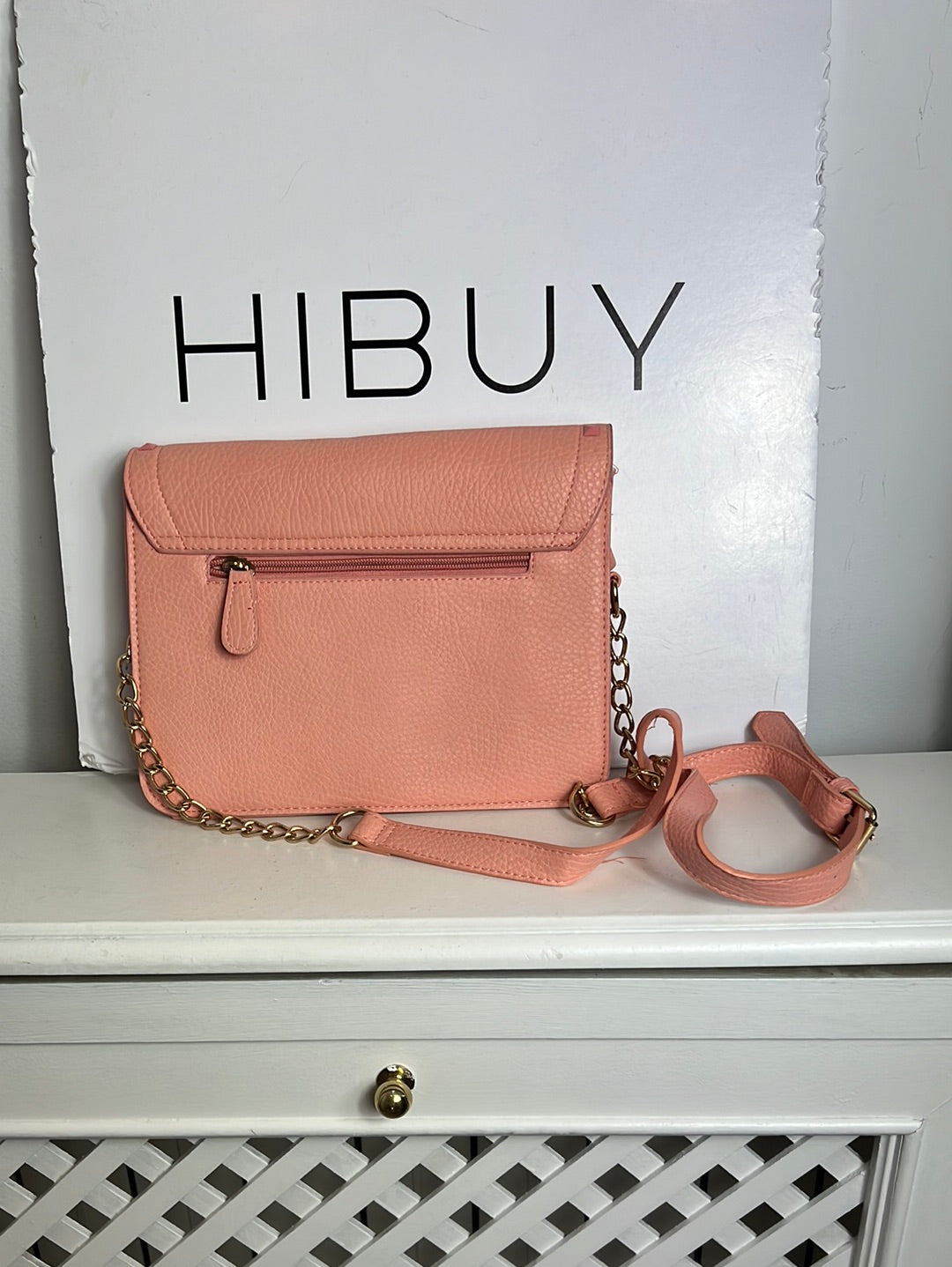 WHITE. Pink studded bag