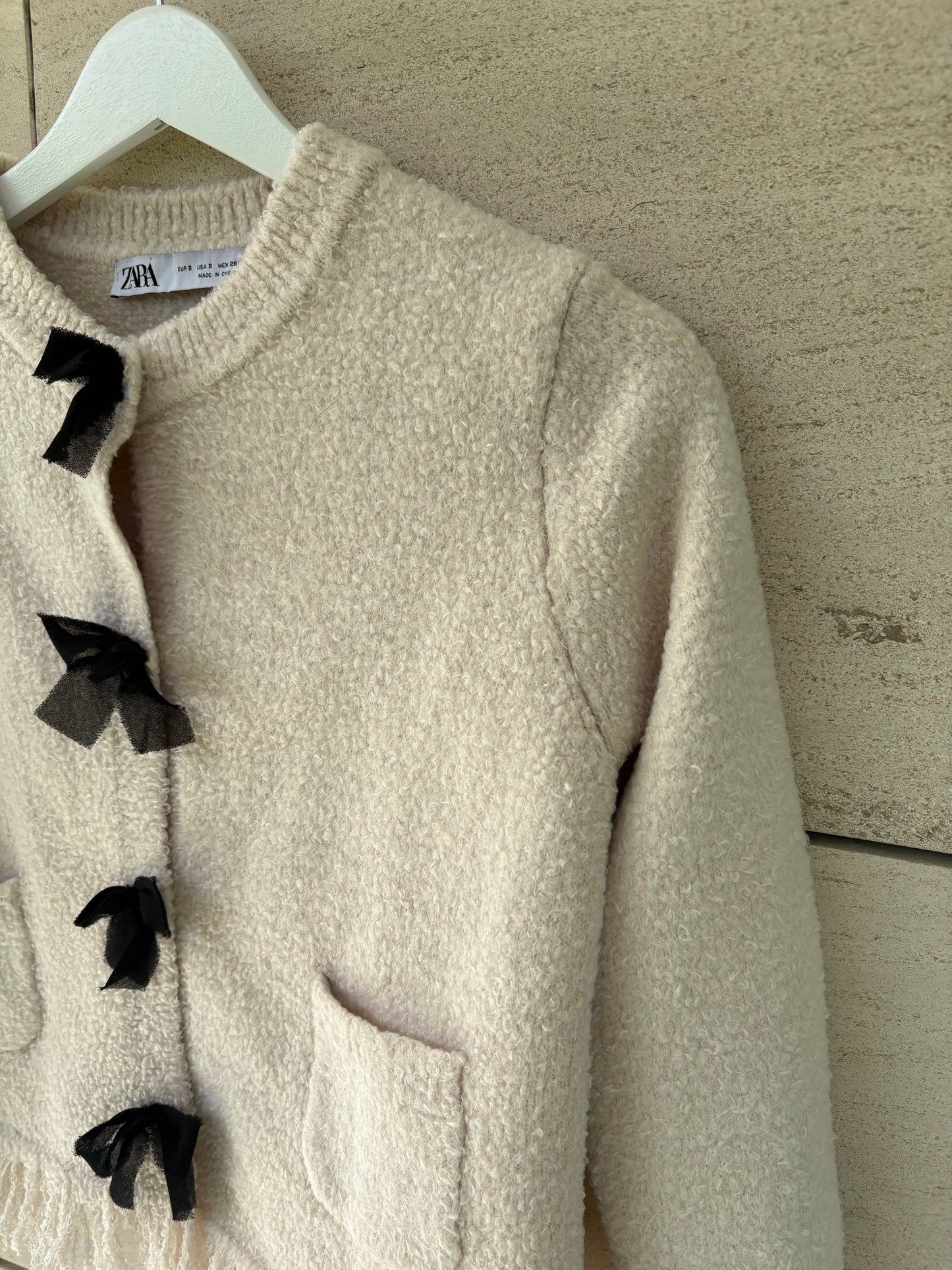 ZARA. Chaqueta punto lazos. T S