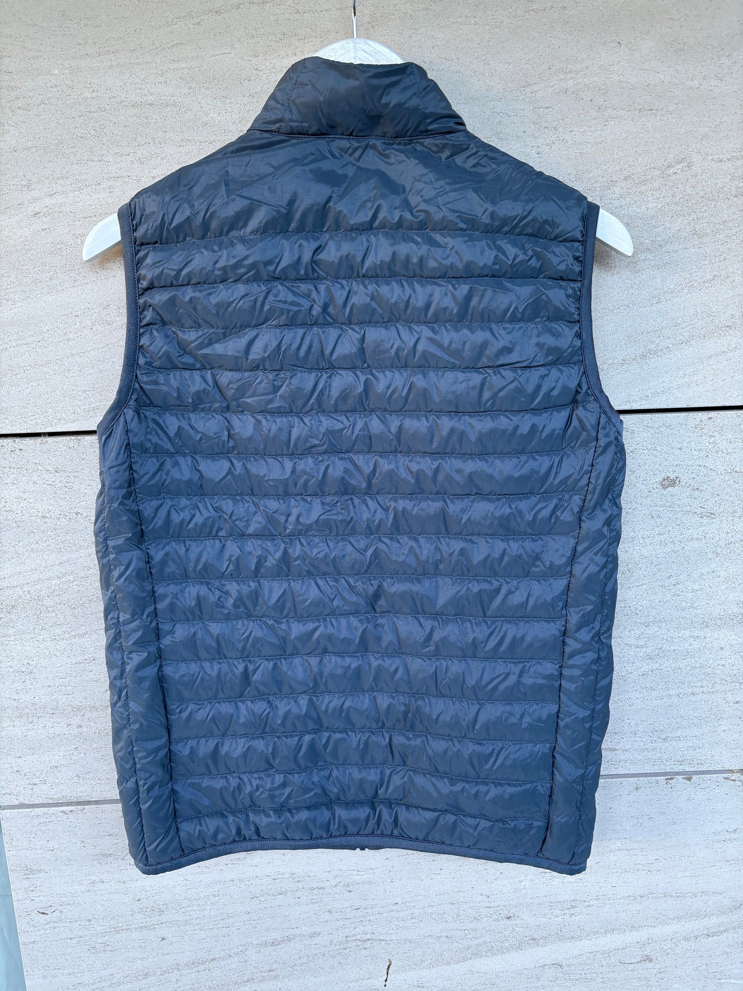UNIQLO. Ultralight down vest in blue. XS
