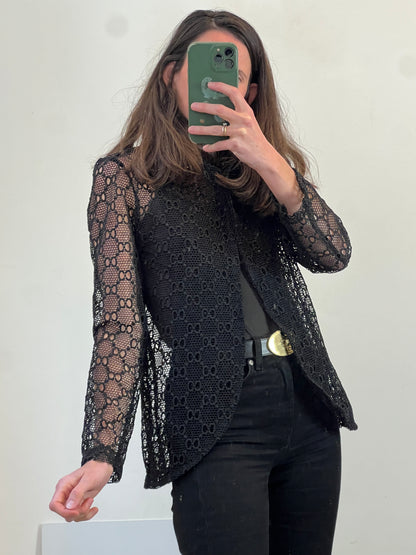 OTRAS. Chaqueta negra troquelada. T S/M