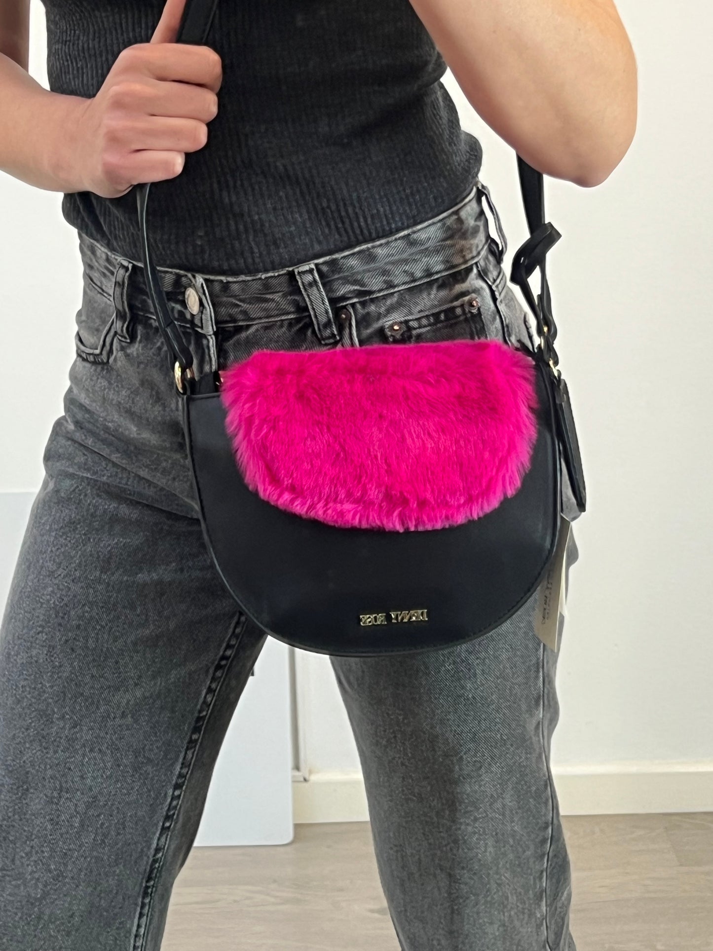 DENNY ROSE. Black bag with pink fur flap
