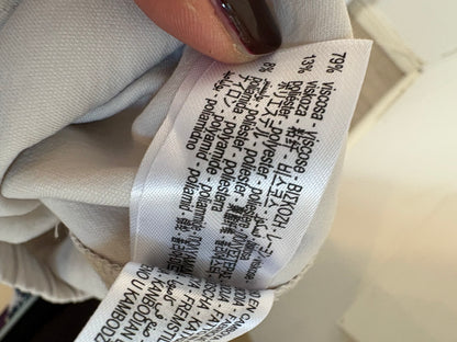 ZARA. Pantalón fluido beige. T M