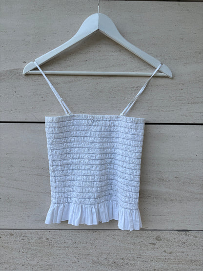 H&M. Top blanco nido de abeja