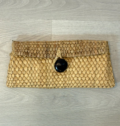 OTRAS. Cartera de mano rafia