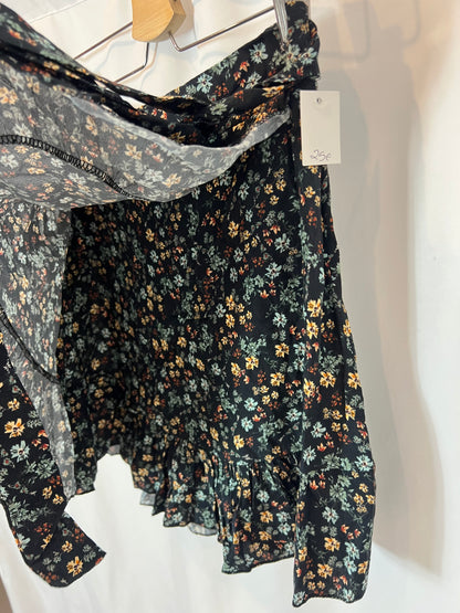 OTRAS. Falda corta flores Tu(S)