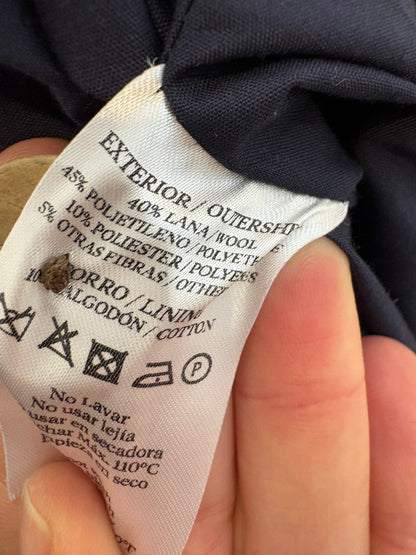 BONNET A POMPÓN . Abrigo cuadros con lana