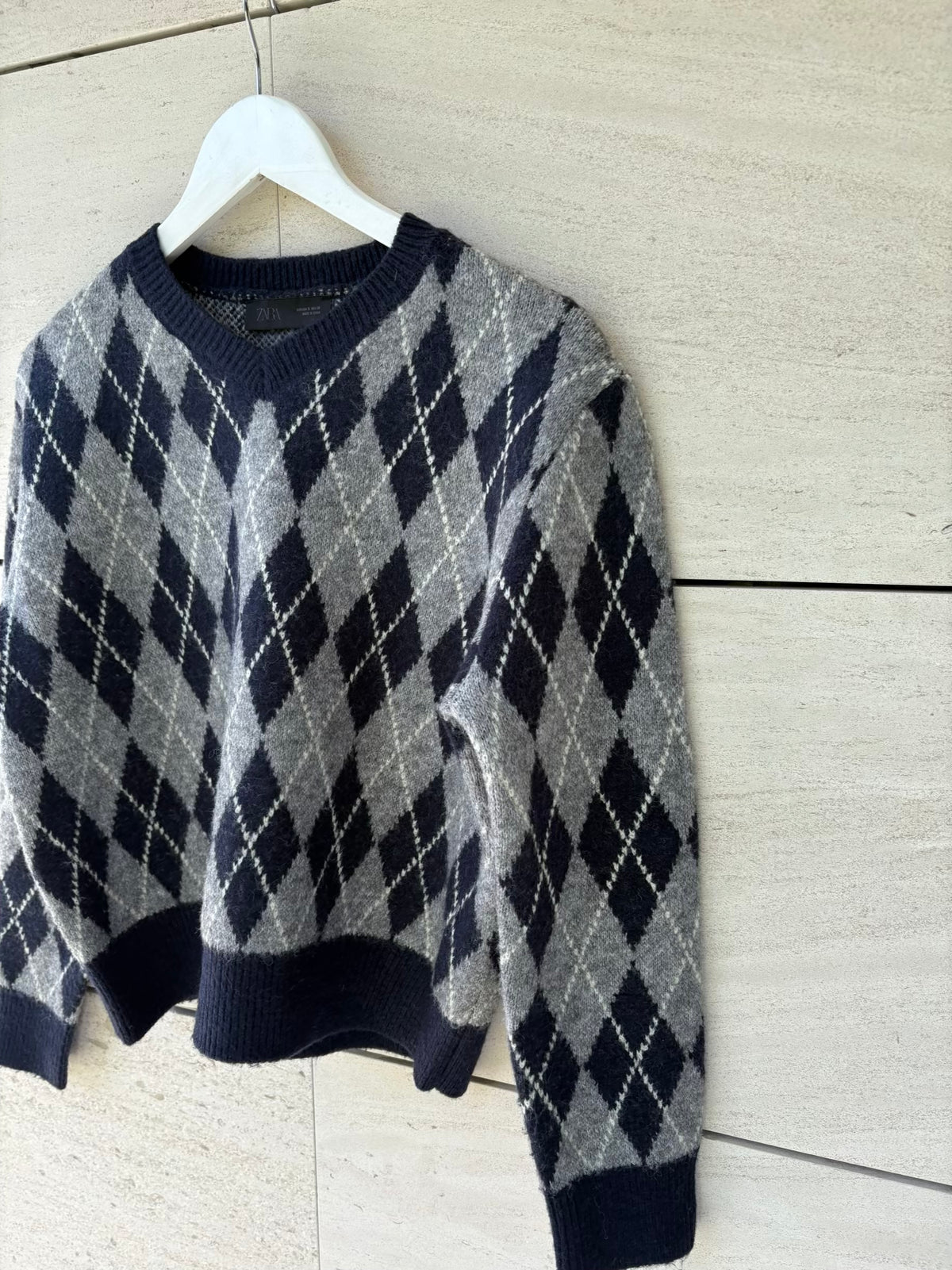 ZARA. Jersey azul rombos