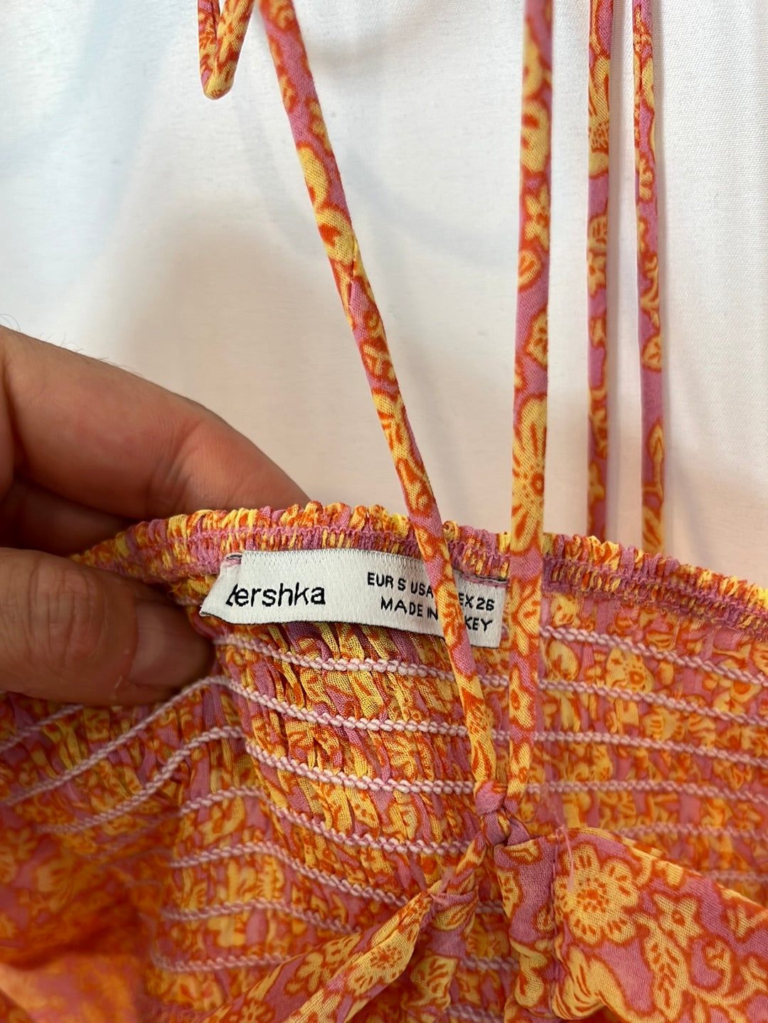 BERSHKA. Top rosa flores T.s