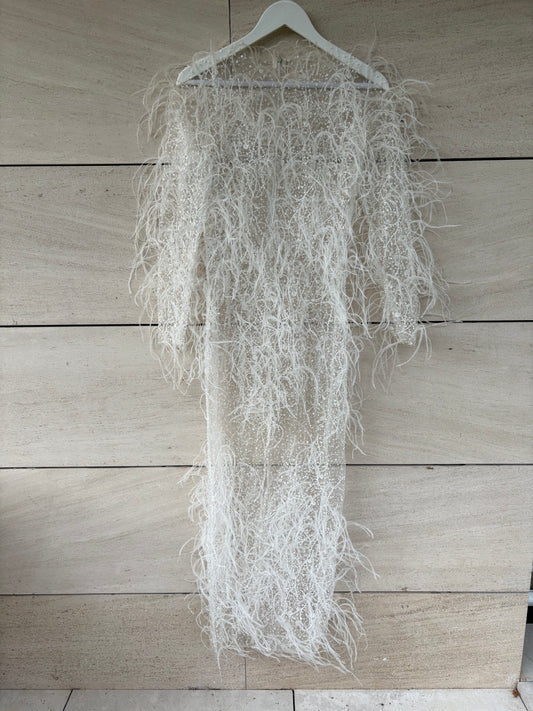 ALICIA RUEDA. Vestido plumas