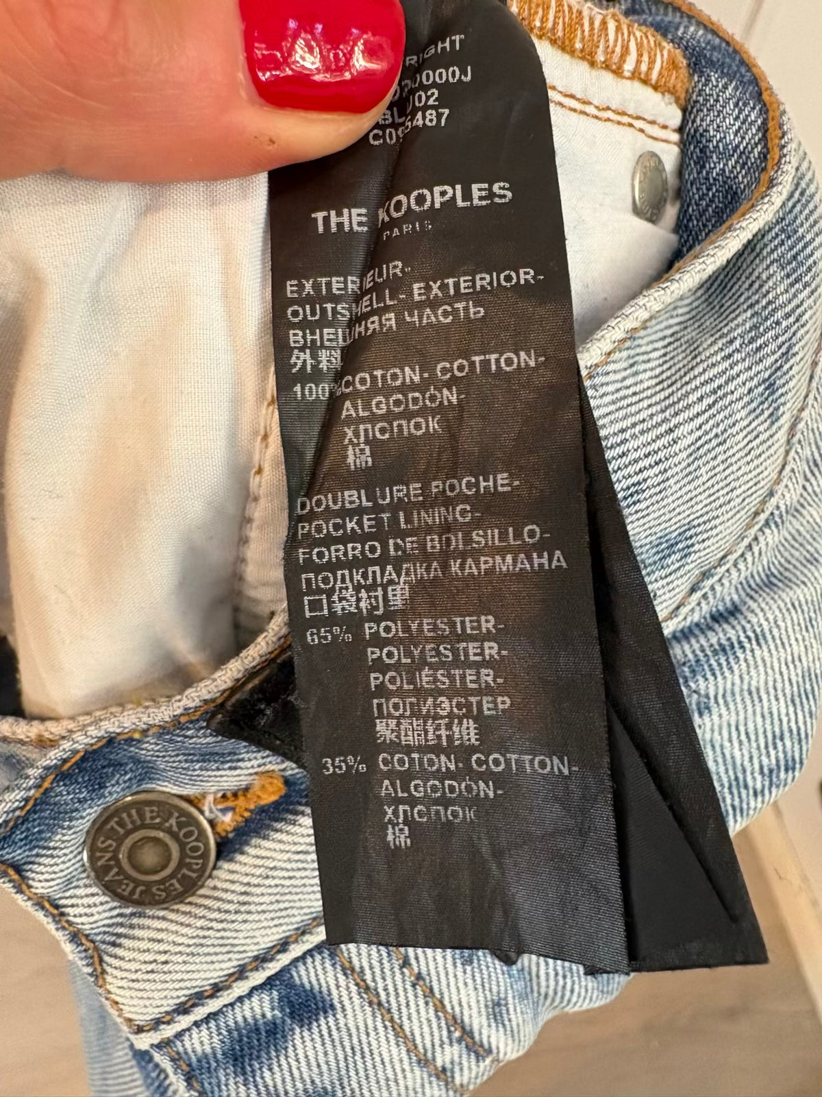 THE KOOPLES. Denim short abotonado detalle hebillas