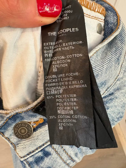 THE KOOPLES. Denim short abotonado detalle hebillas
