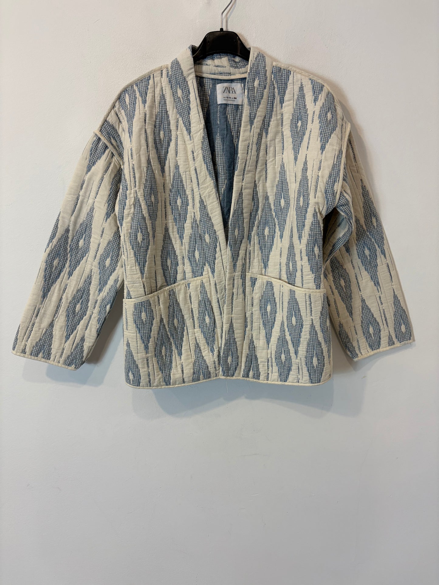 ZARA. Chaqueta azul claro textura