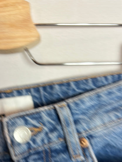 H&M. Denim estilo mom fit. T 34