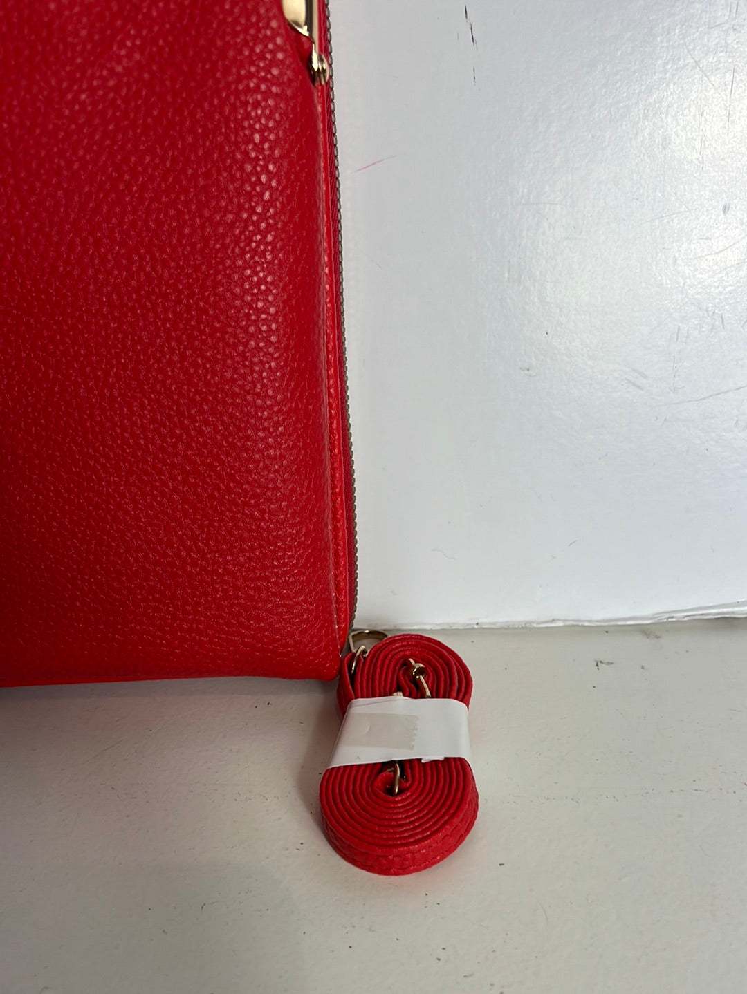 OTRAS. Bolso y cartera mini rojo