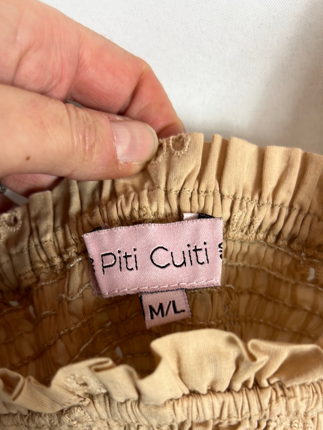 PITI CUITI. Total look rosa empolvado troquelado. T M/L