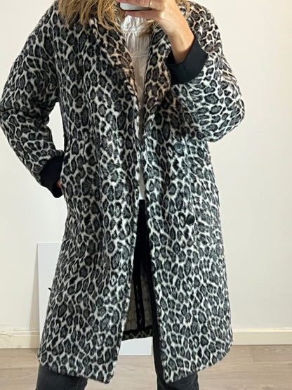 BIMBA Y LOLA. Abrigo textura animal print. TS
