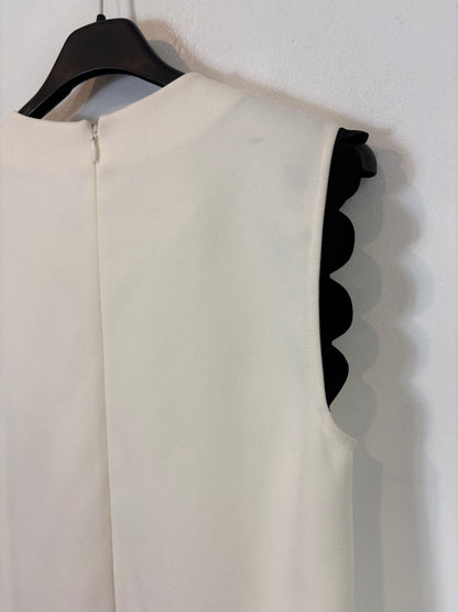 RED VALENTINO. Vestido corto volante. T 40 (S)