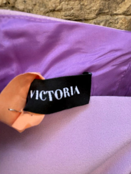 VICTORIA Collection. Vestido midi malva detalle mangas