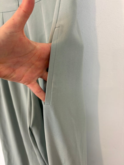 ROBERTO TORRETTA. Green trousers with slits. Size 36