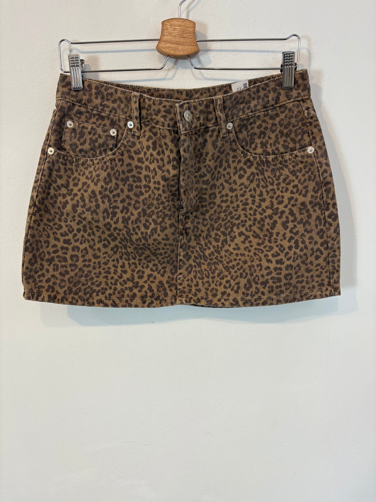ZARA. Falda denim animal print abotonada