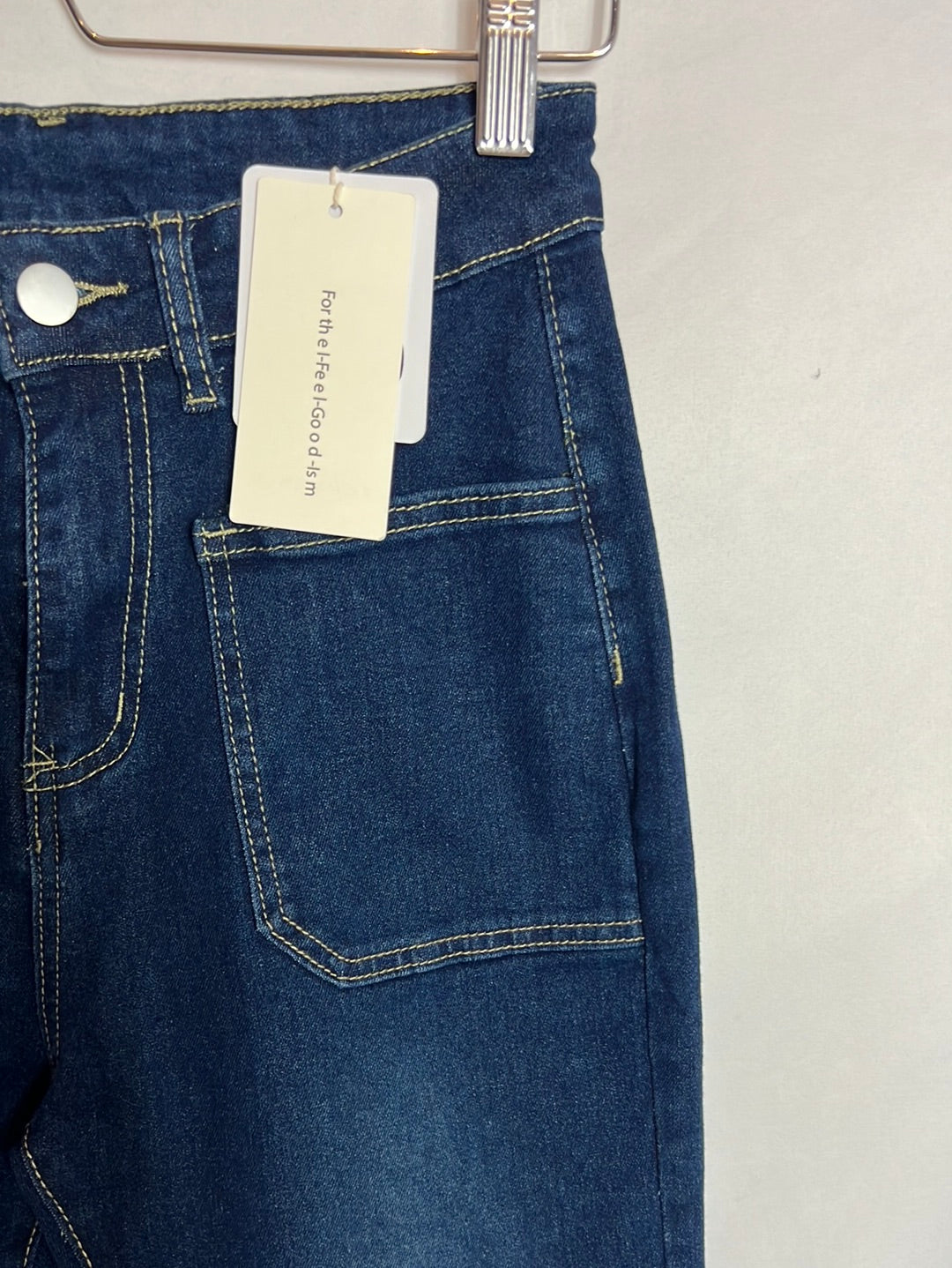 CÓMMENSE. Denim campana bolsillos . T S.