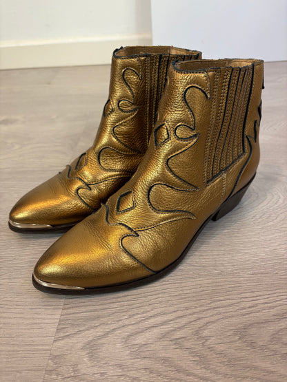 TORAL. Botines dorados piel