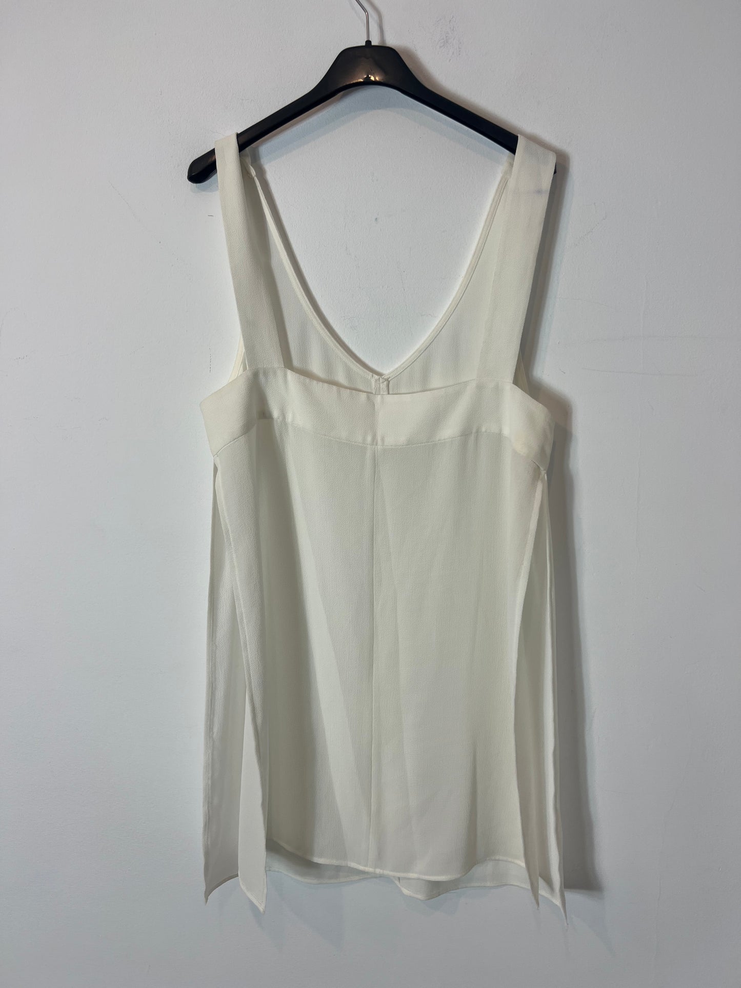 OTRAS. Top blanco fluido aberturas. T M/L
