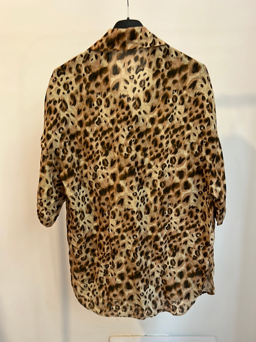 H&amp;M. Animal print short-sleeved blouse. TS