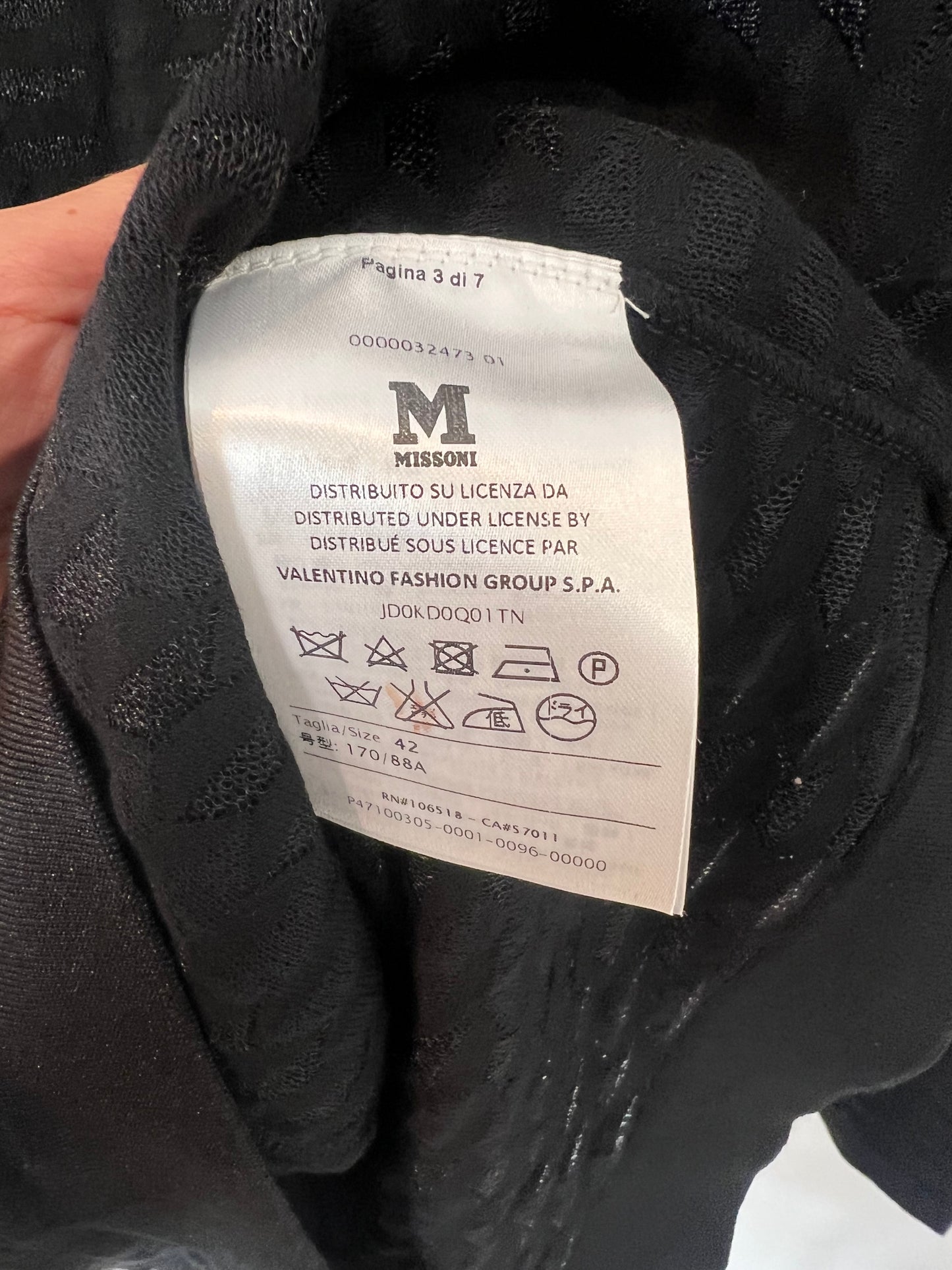 MISSONI. Black dress with shiny thread texture. Size 42