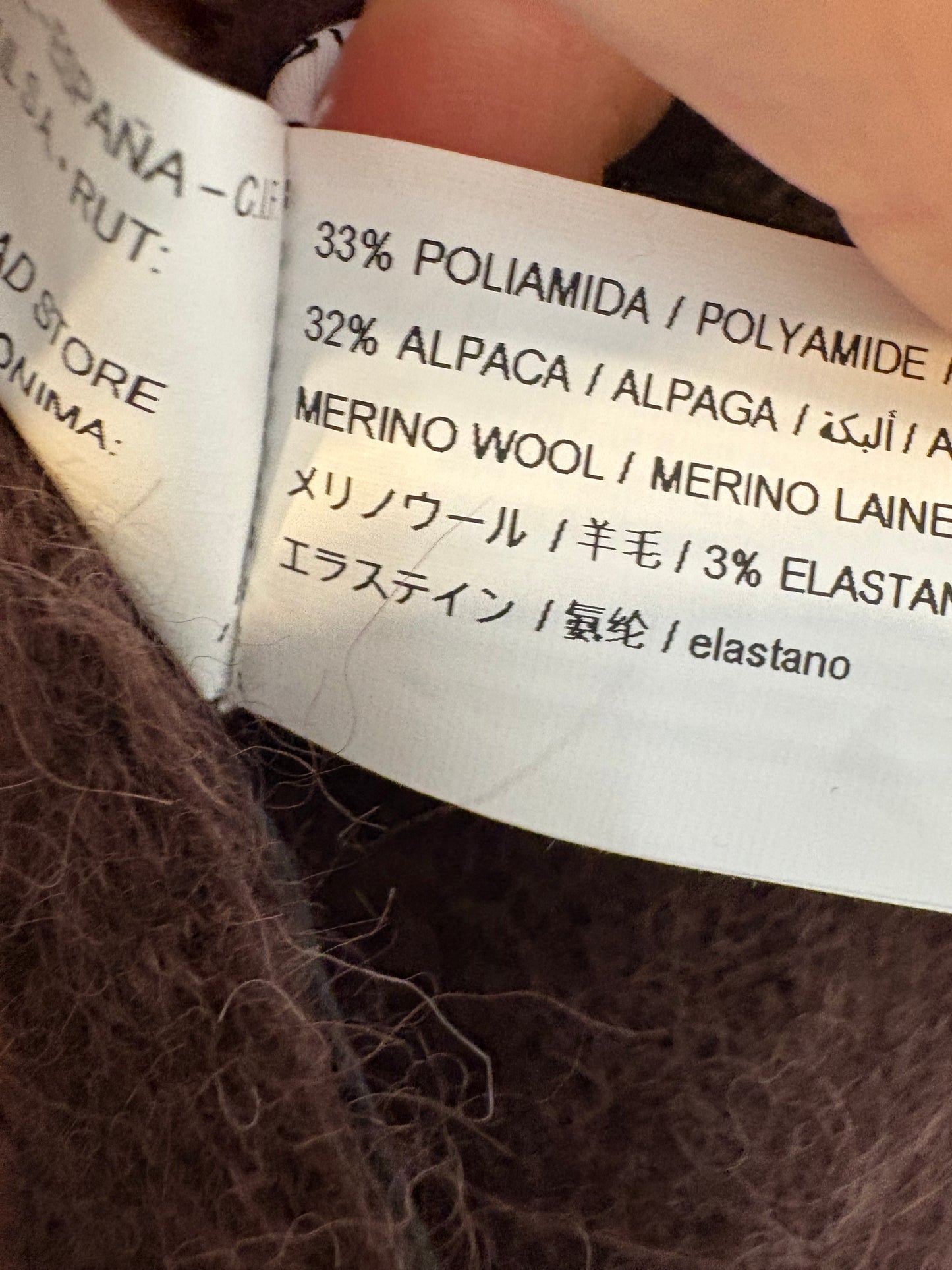 OTHERS. Long knit dress with neckline detail. TS