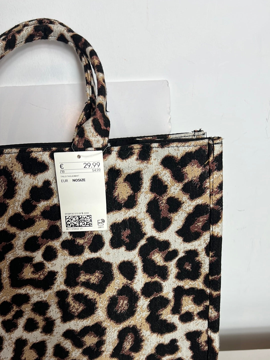H&M. Bolso tote rígido animal print