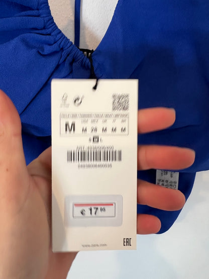 ZARA. Elastic blue top with openings. TM