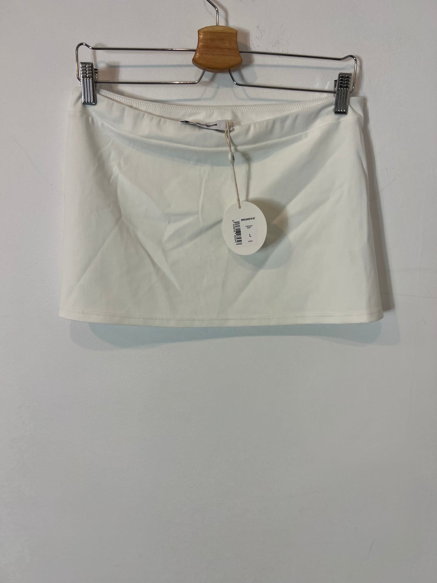 GIMAGUAS. Falda blanca corta semi elástica. T L