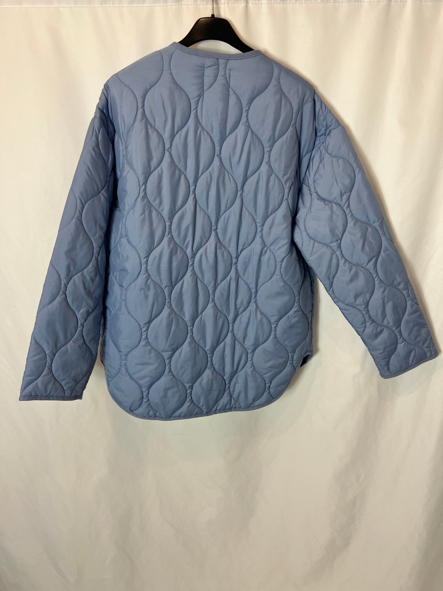 ZARA. Plumas azul bolsillos T.xs