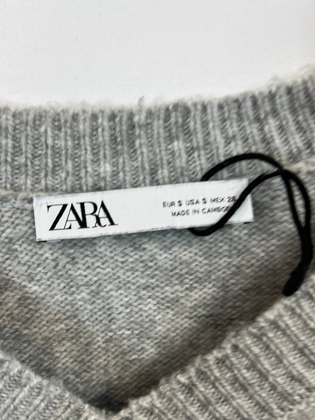 ZARA. Jersey gris jaspeado. T S