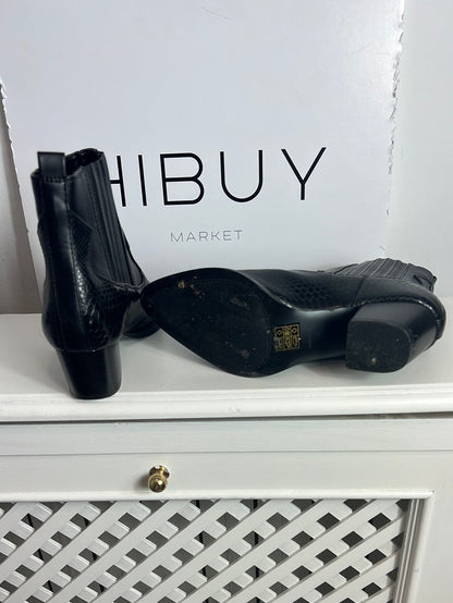 PARFOIS. Botines negros piel efecto animal print. T 38