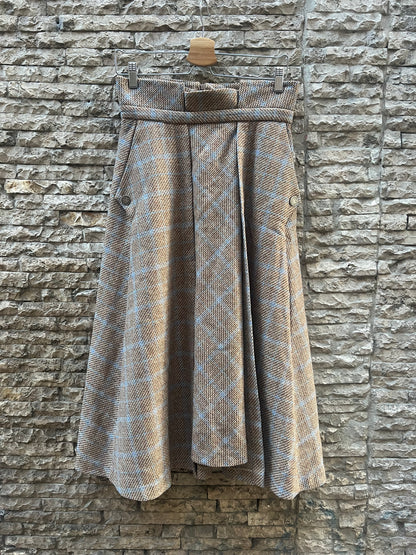 KIUT. Falda midi jaspeada lana