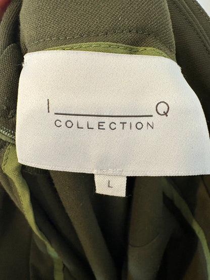 IQ COLLECTION. Falda midi verde bolsillos