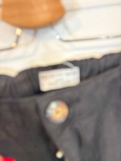 DES PETITIS HAUTS. Pantalón negro pinzas