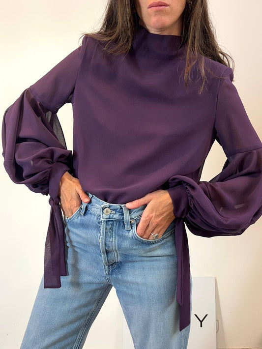 VOGANA. Blusa burdeos lazadas