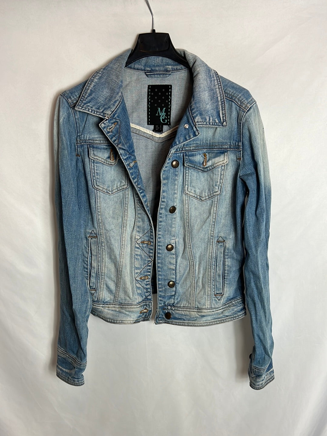 MANGO. Distressed denim jacket. TM