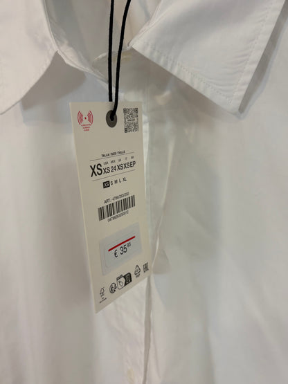 ZARA. Camisa blanca amplia