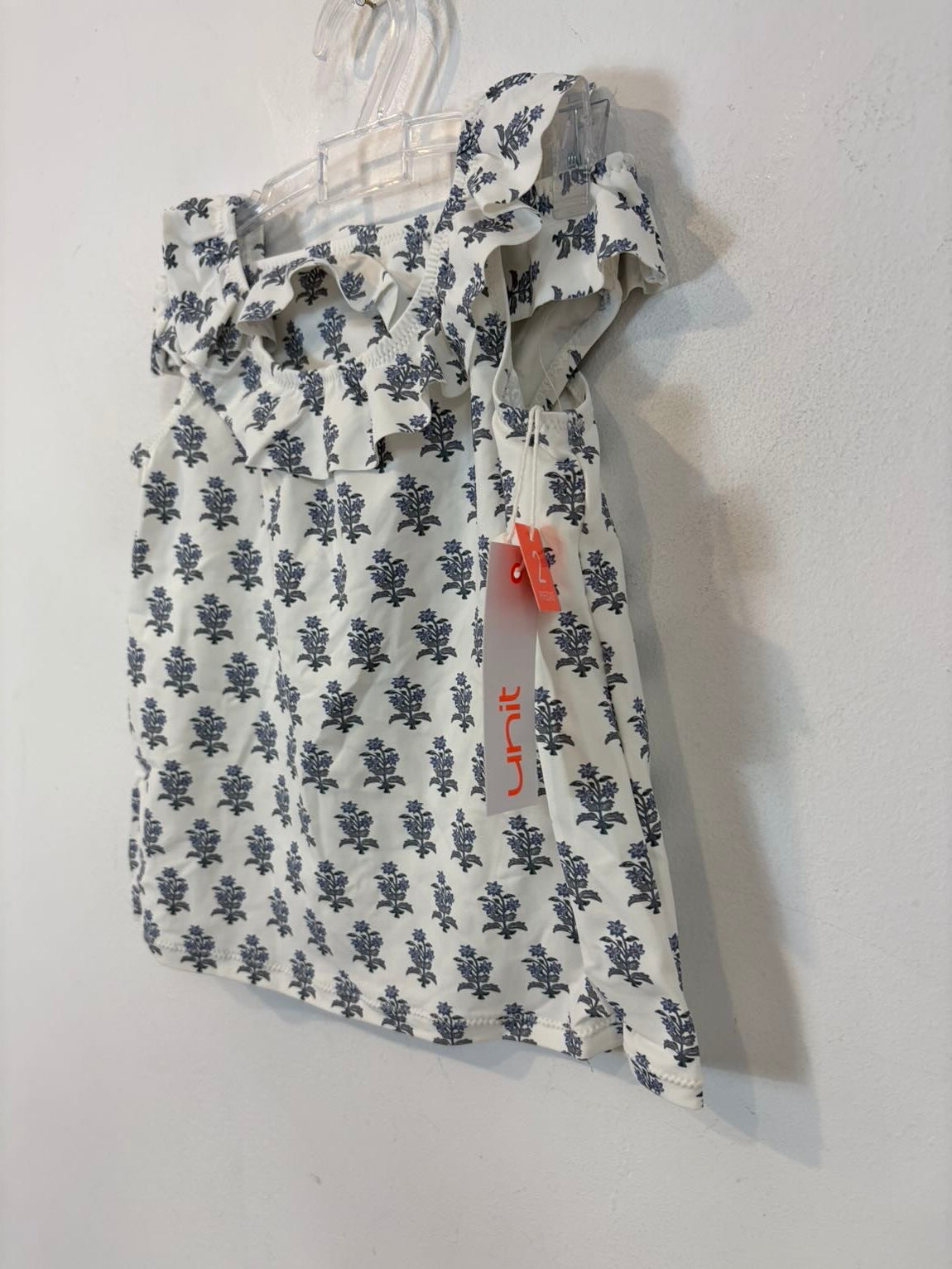 Conjunto baño dos piezas niña  fondo blanco. T 4 años