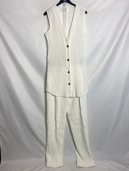 VICTORIA BECKHAM. Total look blanco textura T.36