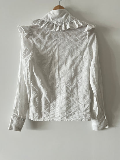 VOGANA. Blusa rayas cuello