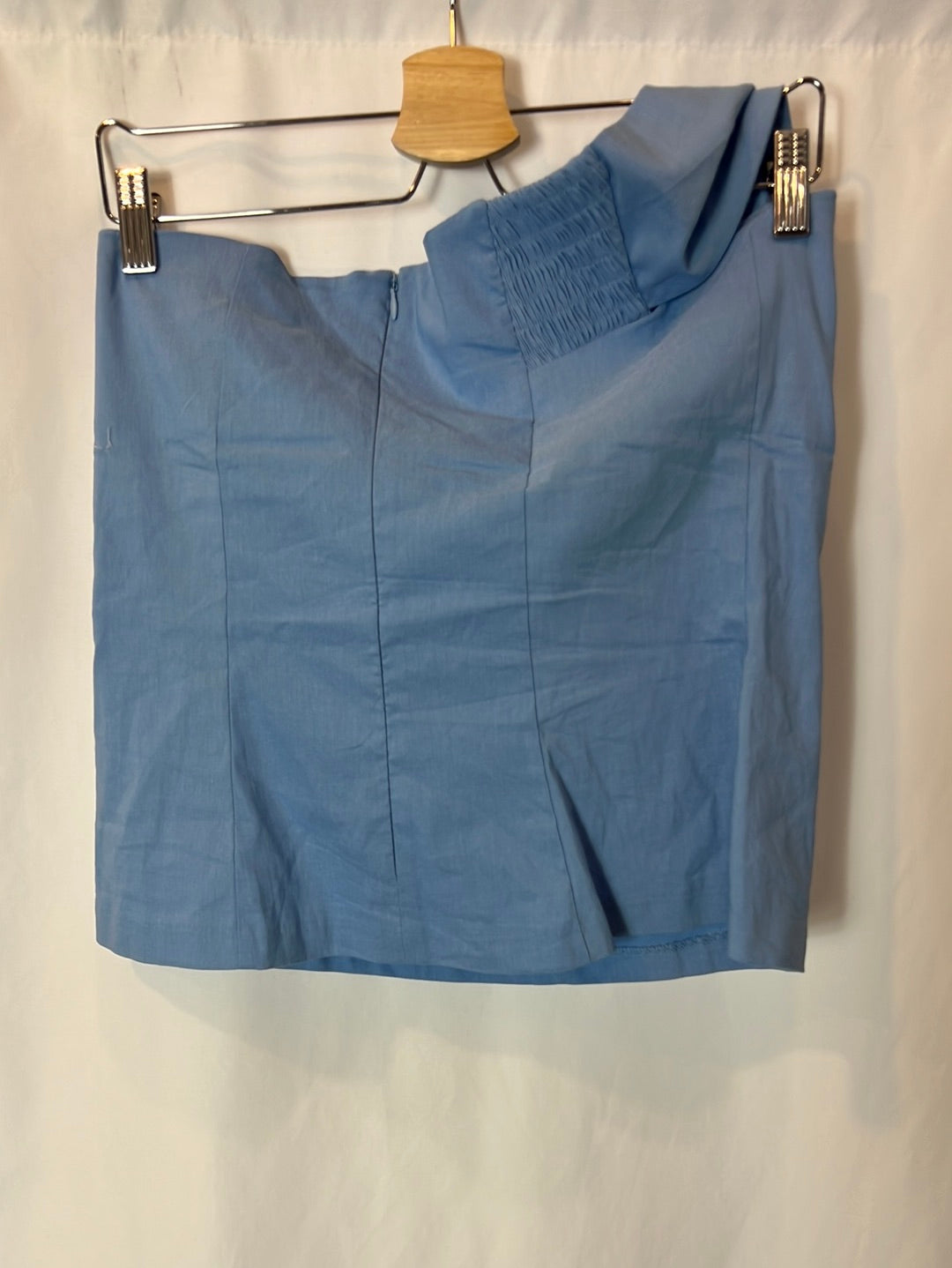 ZARA. Asymmetrical stretch blue top. TM