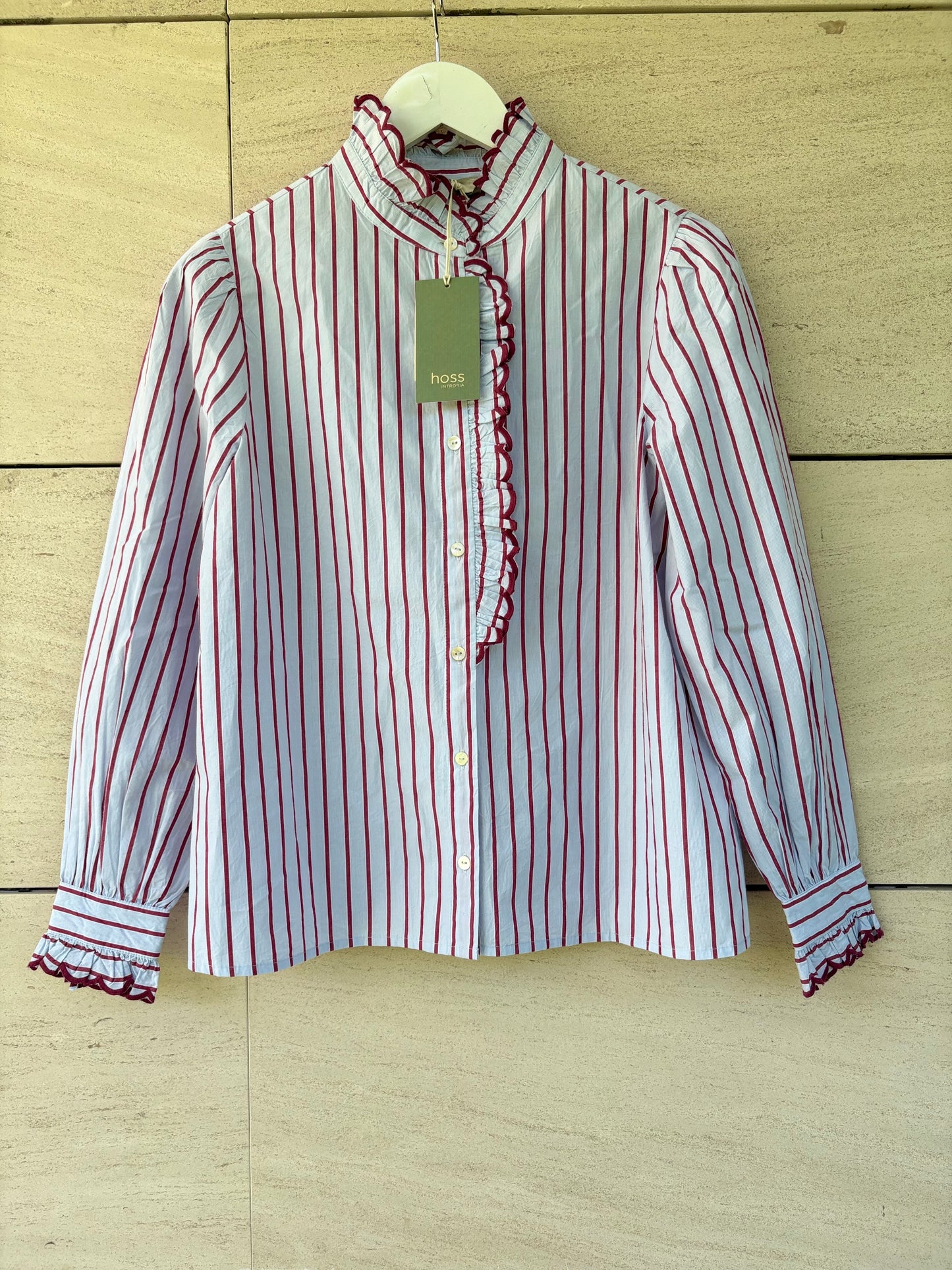 INTROPIA. Camisa raya detalle cuello